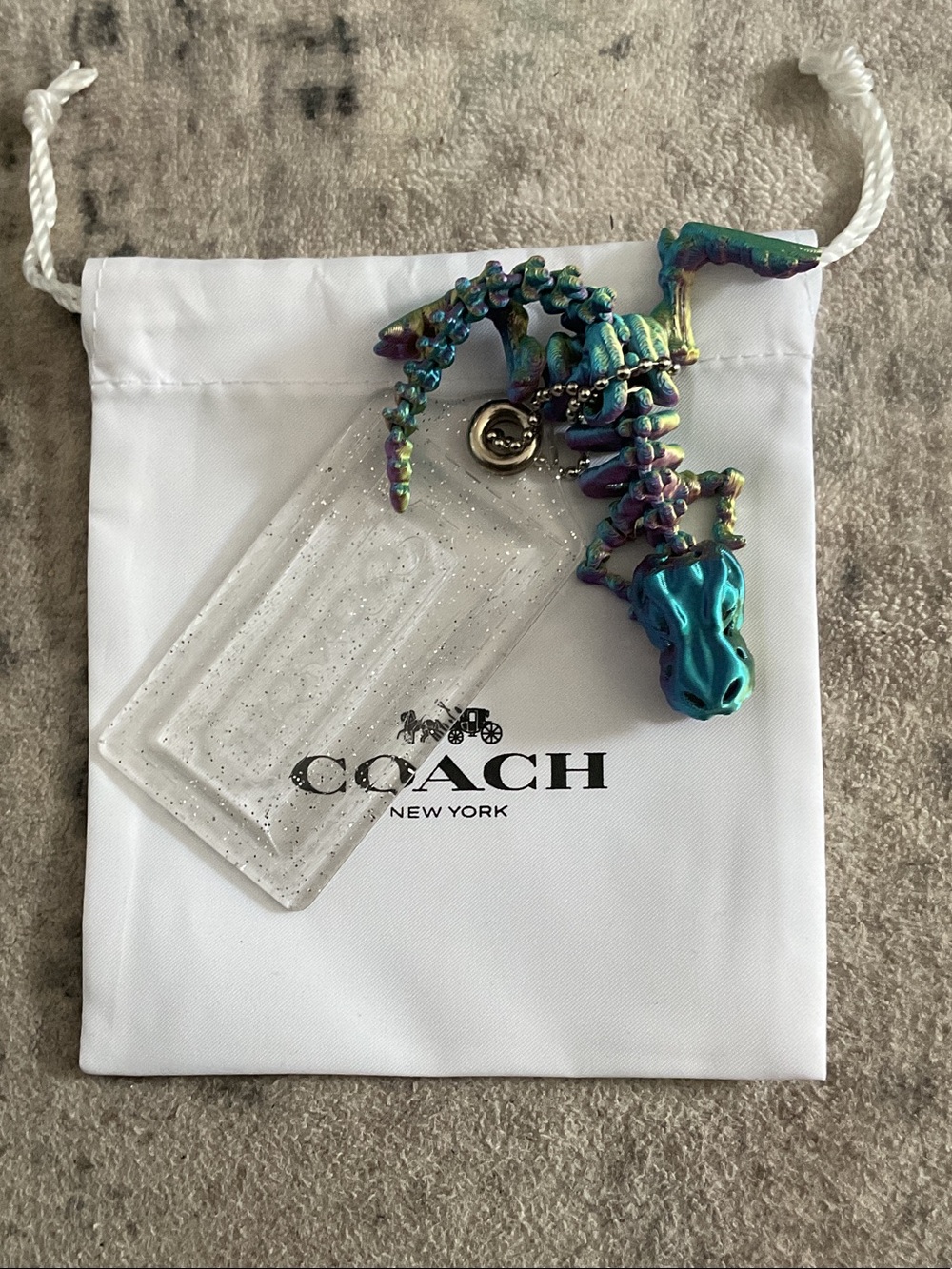Coach Poppy Clear Glitter Hang Tag With Multicolored Unbranded Dragon Charm